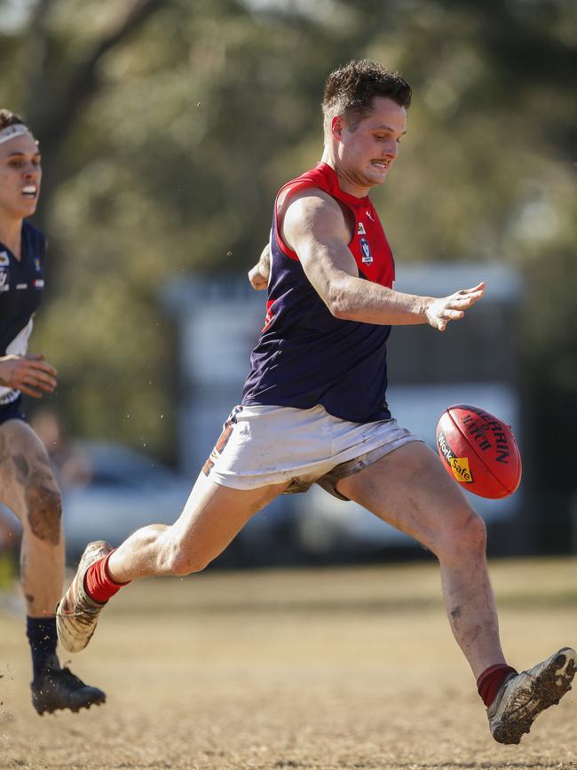 Mt Eliza’s Jarrah Burgess takes a kick.