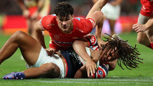 PERTH, AUSTRALIA - AUGUST 02: Herbie Farnworth of the Dolphins tackles Dominic Young of the Roosters during the round 22 NRL match between Dolphins and Sydney Roosters at HBF Park, on August 02, 2024, in Perth, Australia. (Photo by Janelle St Pierre/Getty Images)