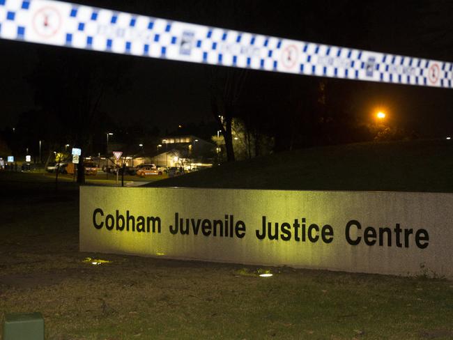 A juvenile justice officer at Cobham Justice Centre was seriously injured after being allegedly attacked by inmates fighting over leftover pies.