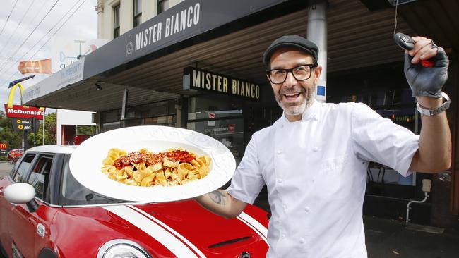 Mister Bianco chef Joseph Vargetto with big bowl of pasta, who's delivering his Scilian food via Mini, as per The Italian Job. Picture: David Caird