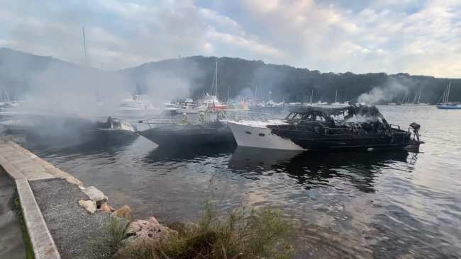 Three boats have been destroyed in a fire at a marina on Sydney's Northern Beaches. Picture: Fire and Rescue NSW