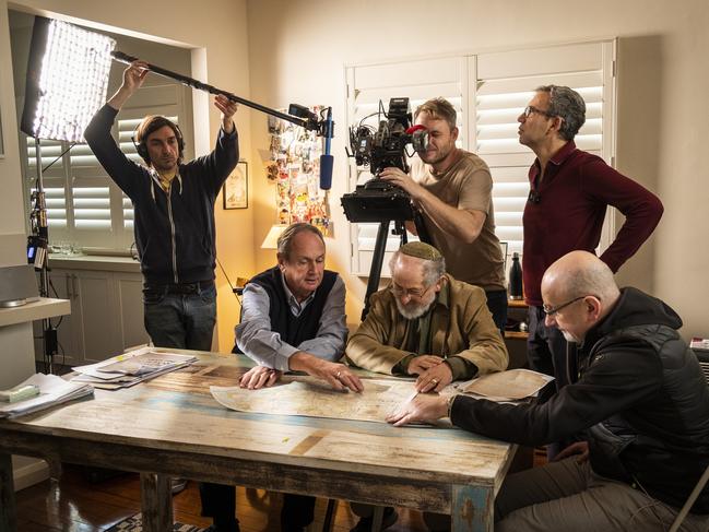 Danny Ben-Moshe (right, standing) directing the documentary, Revenge: Our Dad the Nazi Killer?