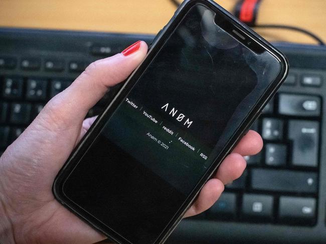 The ANoM app appears on the screen of a smartphone in Paris, on June 8, 2021. - Some 250 people were arrested in Sweden and Finland in the global sting on organised crime, authorities said on June 8, 2021, using phones planted by the US FBI, law enforcement officers were able to read the messages of global underworld figures in around 100 countries as they plotted drug deals, arms transfers and gangland hits on the compromised ANOM devices. (Photo by Olivier MORIN / AFP)