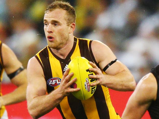 MELBOURNE, VICTORIA - SEPTEMBER 06: Tom Mitchell of the Hawks runs with the ball from Dion Prestia of the Tigers  during the AFL First Qualifying Final match between the Richmond Tigers and the Hawthorn Hawks at Melbourne Cricket Ground on September 6, 2018 in Melbourne, Australia.  (Photo by Michael Dodge/AFL Media/Getty Images)