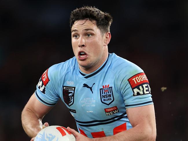 , BRISBANE, AUSTRALIA - JUNE 21: Mitchell Moses of the Blues is tackled during game two of the State of Origin series between the Queensland Maroons and the New South Wales Blues at Suncorp Stadium on June 21, 2023 in Brisbane, Australia. (Photo by Chris Hyde/Getty Images)