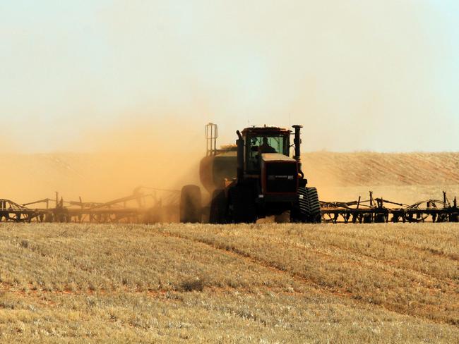 Heavy duty: Clay Gowers starts sowing lupins on his family's Nowingi farm midway between Ouyen and Mildura this week. Picture: Glenn Milne.