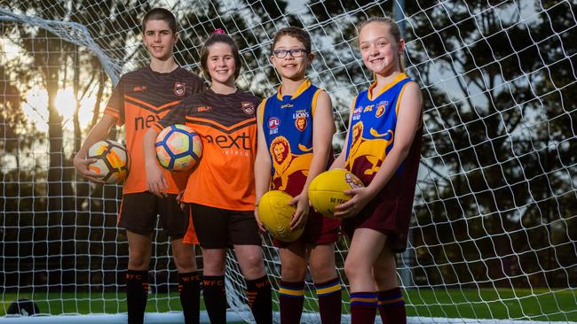 It’s all smiles as the new synthetic pitch opens. Picture: (AAP IMAGE/Jordan Shields)