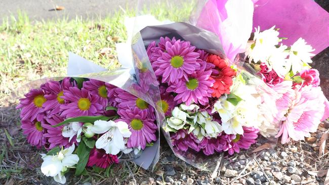 Flowers laid where three people died at Arundel. Picture: Richard Gosling