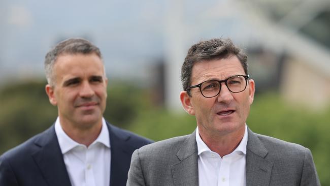 AFL fixture boss Travis Auld with SA Premier Peter Malinauskas during a presser in Adelaide to announce the Gather round of AFL matches to be played in Adelaide in 2023. NCA NewsWire / David Mariuz