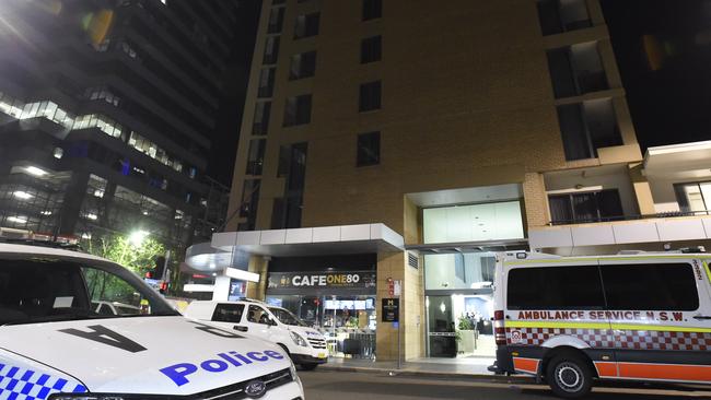 Police and emergency service outside the Meriton Apartments on George Street, Parramatta. Picture: Gordon McComiskie