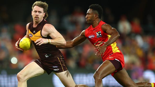 Hewago Oea (right) played his first game of the season in the Suns’ 67-point win over Hawthorn on Sunday. (Photo by Chris Hyde/Getty Images)