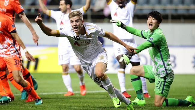 Riley McGree of Adelaide United celebrates after scoring against Jeju United.