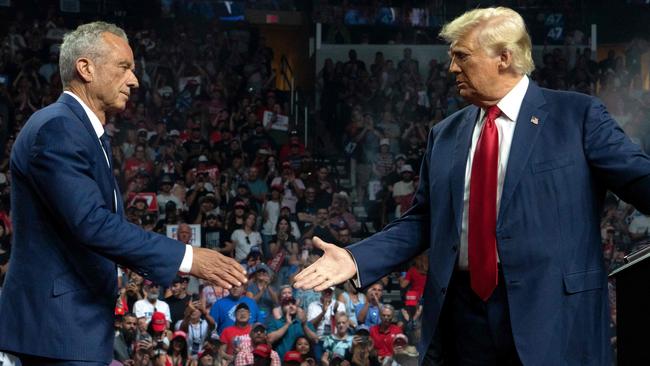 Robert F. Kennedy Jr. and Republican presidential nominee, former US President Donald Trump, shake hands during a campaign rally at Desert Diamond Arena. Picture: Rebecca Noble/Getty Images/AFP