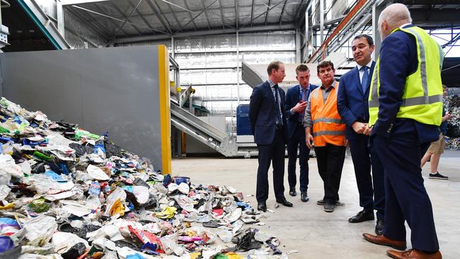 Premier Steven Marshall, Environment Minister David Speirs (left) and Recycling Plastics Australia chief executive Stephen Scherer during a tour of the business in March, 2019. Picture: David Mariuz.