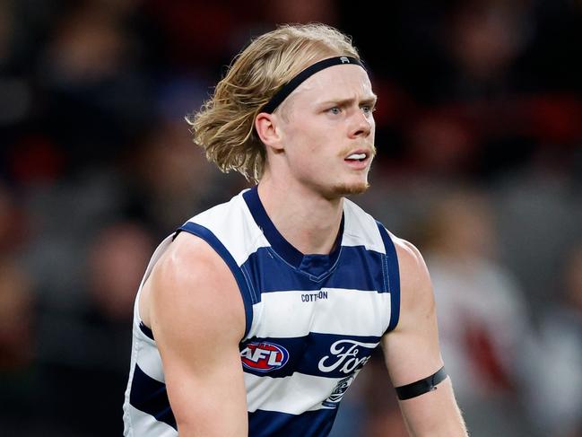 MELBOURNE, AUSTRALIA - AUG 17: Zach Guthrie of the Cats runs with the ball during the 2024 AFL Round 23 match between the St Kilda Saints and the Geelong Cats at Marvel Stadium on August 17, 2024 in Melbourne, Australia. (Photo by Dylan Burns/AFL Photos via Getty Images)