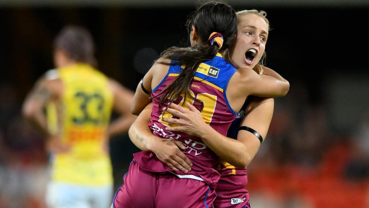 *APAC Sports Pictures of the Week - 2022, November 21* - GOLD COAST, AUSTRALIA - NOVEMBER 18: Courtney Hodder of the Lions celebrates kicking a goal with Isabel Dawes of the Lions during the AFLW Preliminary Final match between the Brisbane Lions and the Adelaide Crows at Metricon Stadium on November 18, 2022 in Gold Coast, Australia. (Photo by Matt Roberts/Getty Images)