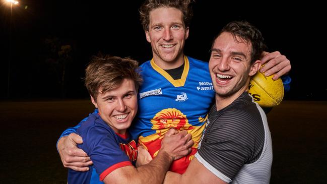 Booleroo Melrose WIlmington (BMW) footballers Mitchell Vogelsang and Levi Proude get around their player coach and Alek Kangur ... the Northern Areas Football Association players who live in Adelaide train at Mitchell Park FC. Picture: Matt Loxton