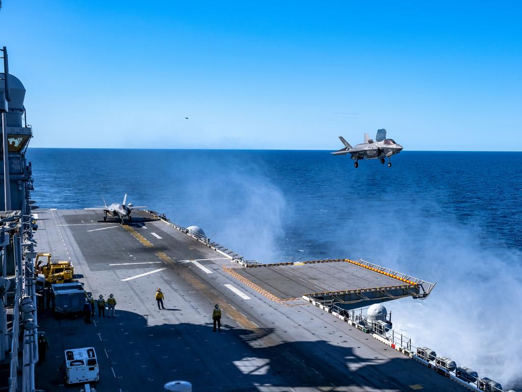 A U.S. Marine Corps F-35B Lightning II with Marine Fighter Attack Squadron 121 attached to Marine Medium Tiltrotor Squadron 265 (Reinforced), 31st Marine Expeditionary Unit (MEU), prepares to land on the flight deck aboard the amphibious assault ship USS America (LHA 6), during Talisman Sabre on July 17, 2021. The F-35B Lightning IIÃ¢â&#130;¬â&#132;¢s fifth generation strike fighter capabilities bring more lethality and flexibility to combat commanders than any other aircraft platform. Australian and U.S. forces combine biannually for Talisman Sabre, a month-long multi-domain exercise that strengthens allied and partner capabilities to respond to the full range of Indo-Pacific security concerns. The 31st MEU is operating aboard ships of America Expeditionary Strike Group in the 7th fleet area of operations to enhance interoperability with allies and partners and serve as a ready response force to defend peace and stability in the Indo-Pacific region. (U.S. Marine Corps photo by Staff Sgt. John Tetrault)