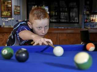 LINE THEM UP: Toowoomba's Callum Hensler, 8, has been named in the Queensland eight ball team that will compete in Tasmania in January. Picture: Bev Lacey