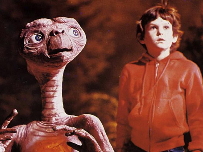 Actor Henry Thomas and ET in scene from film 