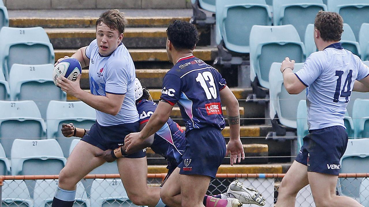 Waratahs' Tom Klem with the ball.