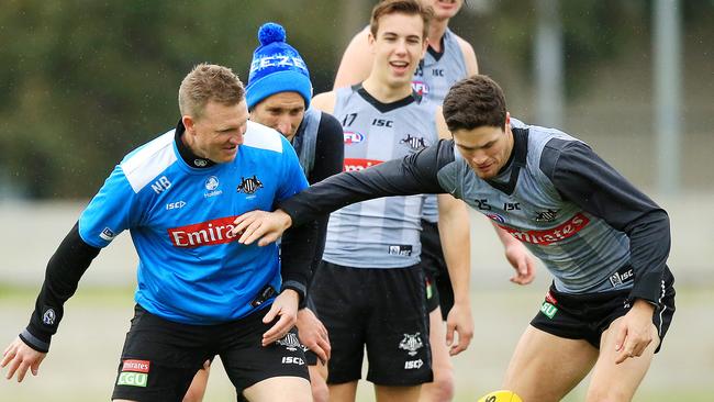 Nathan Buckley and Jack Crisp at Pies training. Picture: Mark Stewart