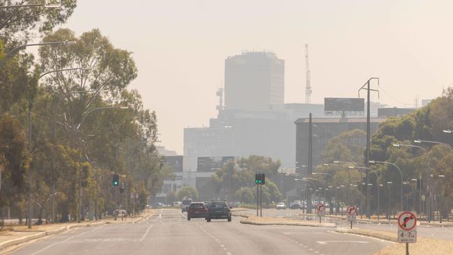 Smoke from Victoria passes over the Adelaide CBD on Sunday. Picture: Ben Clark