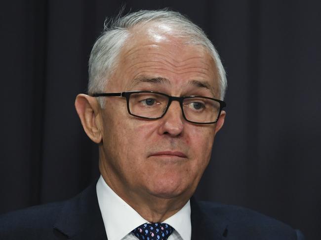 ***ALTERNATIVE CROP*** Australian Prime Minister Malcolm Turnbull and Australian Energy Minister Josh Frydenberg speak during a press conference at Parliament House in Canberra, Monday, August 20, 2018.  (AAP Image/Lukas Coch) NO ARCHIVING