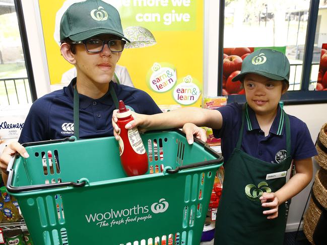 Giuseppe Piperata, 12, and Shari-Anne Pearson, 12, remember a vital item, tomato sauce. Picture: John Appleyard