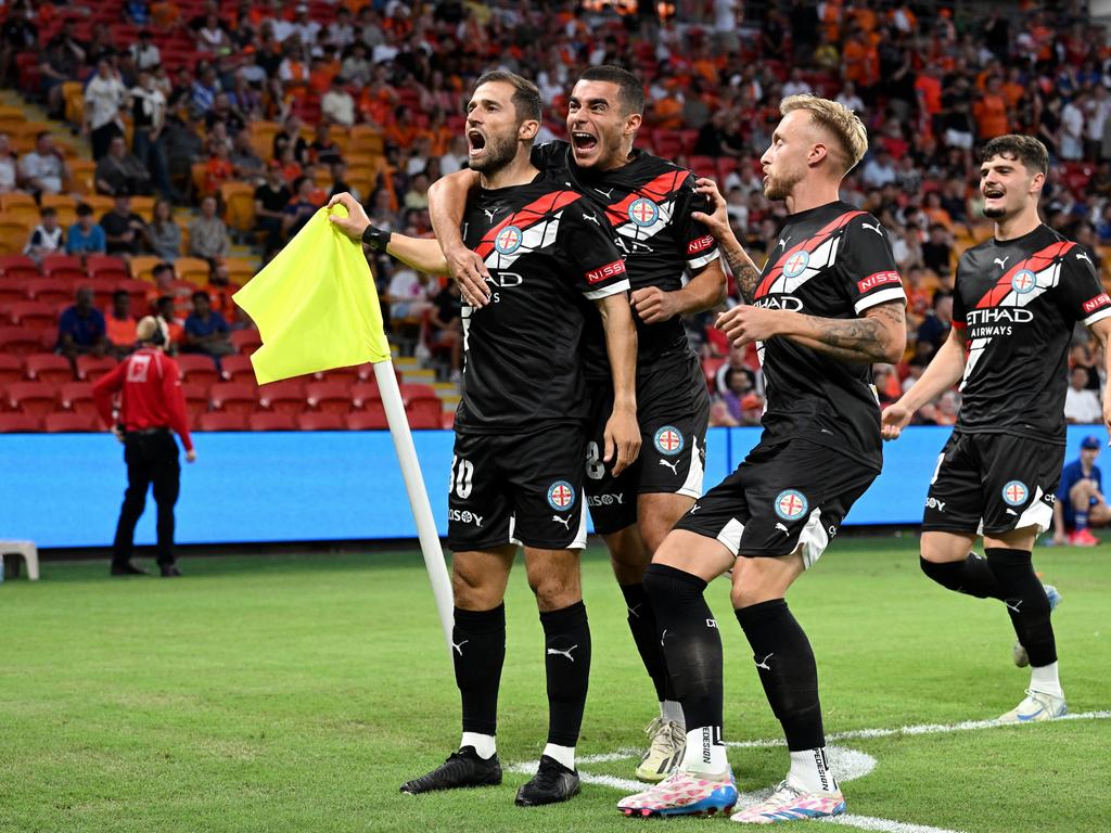 Andreas Kuen (left) celebrates with teammates after scoring for Melbourne City. Picture: Bradley Kanaris/Getty Images