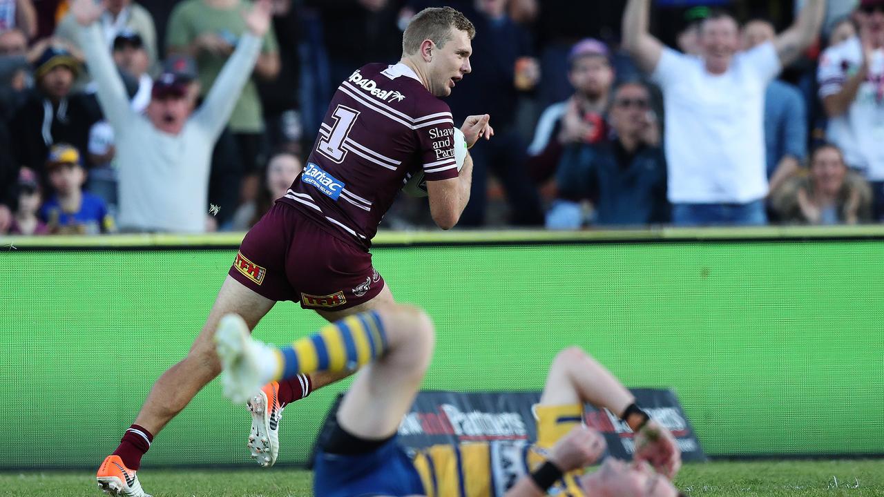 Manly's Tom Trbojevic steals the ball from Parramatta's Clint Gutherson to score at Lottoland.