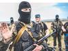 An armed pro-Russian separatists gestures as he blocks the way to the crash site of Malaysia Airlines Flight MH17, near the village of Grabove, in the region of Donetsk on July 20, 2014. The missile system used to shoot down a Malaysian airliner was handed to pro-Russian separatists in Ukraine by Moscow, the top US diplomat said Sunday. Outraged world leaders have demanded Russia's immediate cooperation in a prompt and independent probe into the shooting down on July 17 of flight MH17 with 298 people on board. AFP PHOTO/ BULENT KILIC