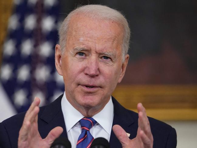 (FILES) In this file photo taken on April 2, 2021, US President Joe Biden speaks about the March jobs report in the State Dining Room of the White House in Washington, DC. - President Joe Biden hopes to give a shot of adrenaline to the planet's sluggish fight against climate change with an Earth Day summit but a question lingers -- can the United States be trusted to lead? (Photo by MANDEL NGAN / AFP)