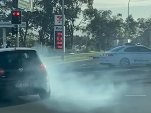 A motorist has captured the moment a car leads police on a pursuit in Wollongong. Picture: Nikki Ristoski/Facebook
