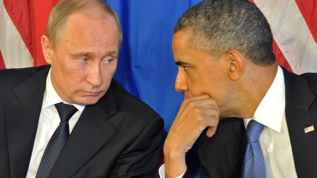 epa04129211 (FILE) A file picture dated 18 June 2012 shows US President Barack Obama (R) talking with Russian President Vladimir Putin (L) during their meeting at Esperansa hotel prior G20 summit in Los Cabos, Mexico. More than 95 per cent of Crimeans voted for the Ukrainian region's accession to Russia in a controversial referendum on 16 March, according to preliminary results. The White House on 16 March 2014 said that President Obama told his Russian counterpart that the US would not recognize the Crimean vote as it violated the Ukrainian constitution. Furthermore, the US were 'prepared to impose additional costs on Russia for its actions.' EPA/ALEXEI NIKOLSKY/RIA NOVOSTI/KREMLIN POOL *** Local Caption *** 50394581