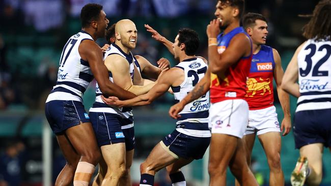 Gary Ablett celebrates a goal with his teammates. Picture: Getty