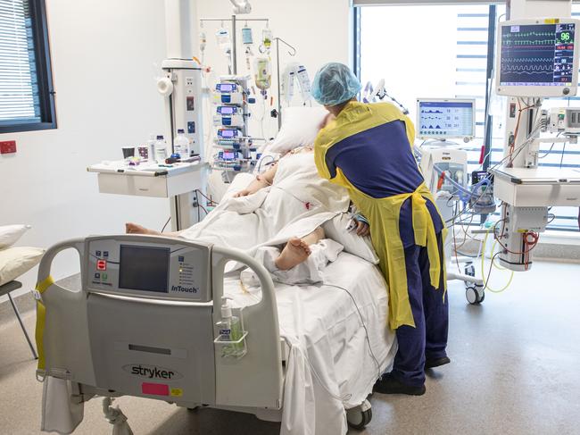 A nurse in the intensive care unit at Northern Beaches Hospital. There are concerns that staff are being stretched to the limit. Picture Chris Pavlich