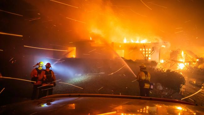 The fires accelerated at an unforgiving pace overnight. Picture: Apu Gomes/Getty Images/AFP