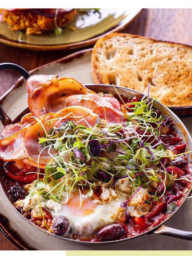 Mr Robertson’s baked eggs — a medley of mushrooms, heirloom tomatoes, olives and feta.