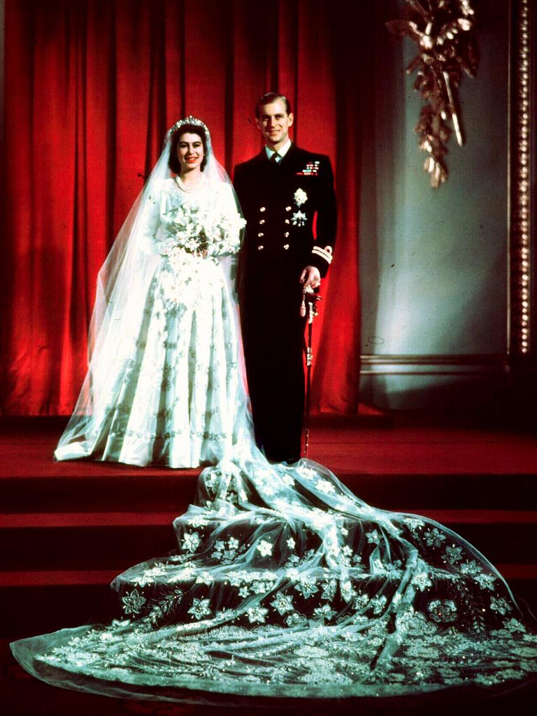 Elizabeth and Philip, now the Duke of Edinburgh, were married at Westminster Abbey on November 20, 1947, with the Queen wearing a Norman Hartnell gown and her groom in his Naval uniform. Despite the splendour of the occasion, post-war austerity measures were still in place and the Princess used ration stamps to pay for the material of her dress.