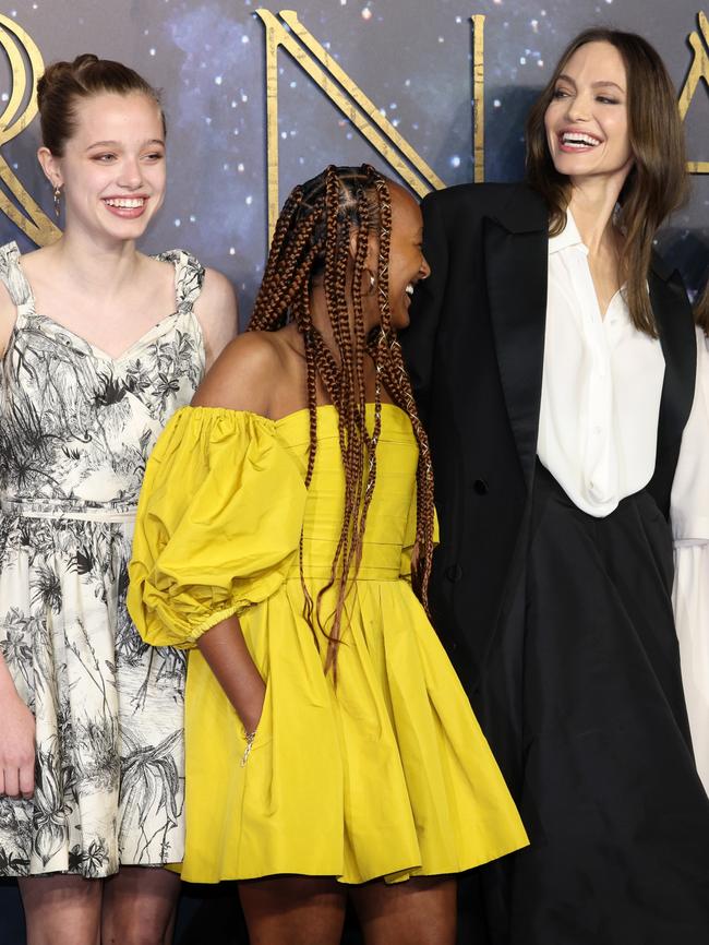 Shilo (left) with sister Zahara and mum Angelina surprised many wearing a dress to the Eternals UK Premiere in 2021. Picture: Tim P Whitby / Getty Images