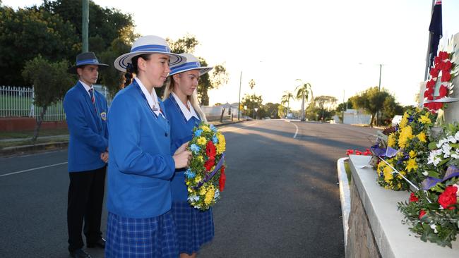 College Captains, Bree-Anna Meehan and Jasmine Thompson laying wreath at Cenotaph.