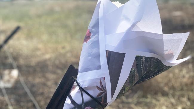 Flowers at the Waterloo Corner crash site. Picture: Tara Miko