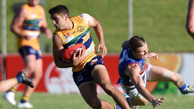 Eagle Jared Petrenko on the run. Picture: Roger Wyman