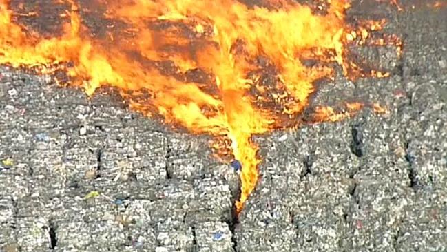 It was the second time the stockpiles set fire in 24-hours. Picture: 7 NEWS