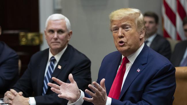 President Donald Trump with Vice President Mike Pence, speaks during a coronavirus briefing with Airline CEOs in the Roosevelt Room of the White House on March 4.