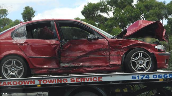 One of the vehicles involved in the crash is towed away from the scene. Picture: LVI&amp;CA