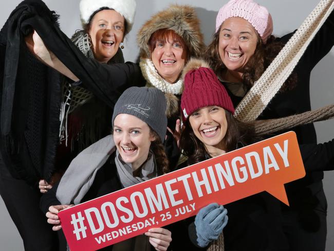 Staff at Gosford RSL (L-R back) Kim Golsby, Nola Ryan, Emma Benson, ( front) Kate Vane-Tempest and Georgia Ryan Pose with scarfs, beanies and gloves which have been donated to their campaign drive. July 10 2018 ( AAP Image / Mark Scott )