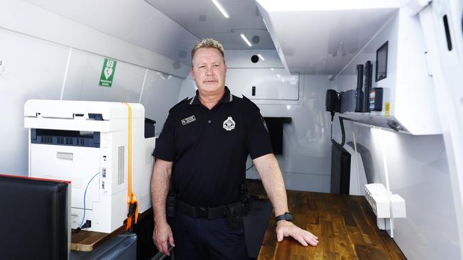 Senior Sergeant Gary Hunter inside the Mobile Police Beat van. Picture: Brendan Radke