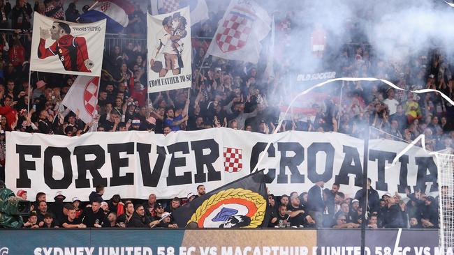 Sydney United fans enjoy the atmosphere during the Australia Cup Final match between Sydney United 58 FC and Macarthur FC at Allianz Stadium. Pic: Cameron Spencer/Getty Images